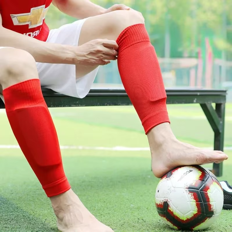 Voetbal afgeknipte sok. Pre cut sleeve voor voetballers. Rood voetballer.